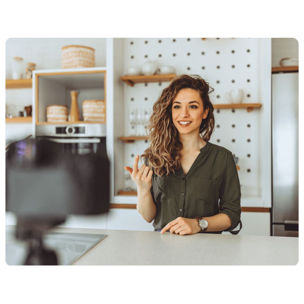 A female home decor social media influencer talking on camera.