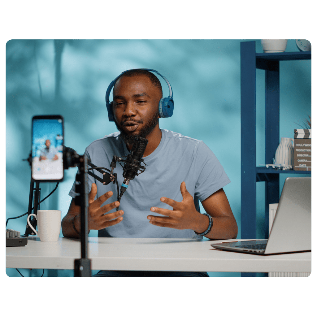 A male, technology social media influencer talks to his following on a live stream.